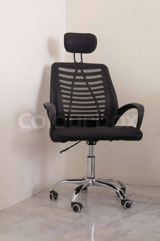 black ergonomic office chair featuring adjustable height, lumbar support, and swivel base. Ideal for home offices