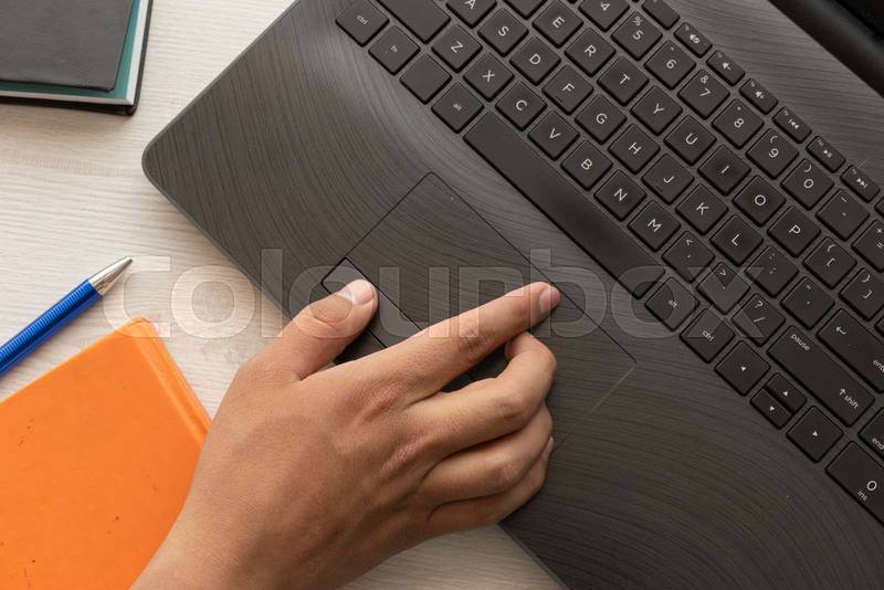 hand of a person using a laptop, detail of the keys