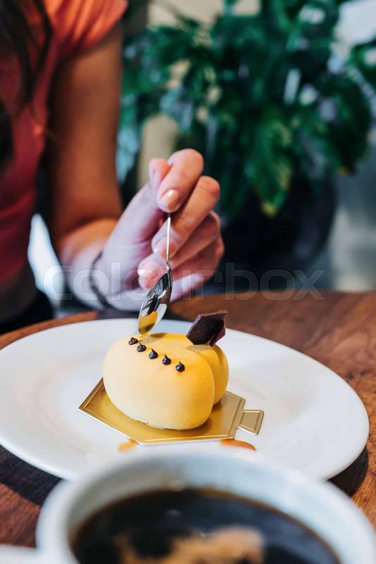 plate with heart-shaped cake decorated with icing, restaurant