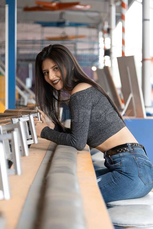 lifestyle of cheerful latin woman with long black hair,