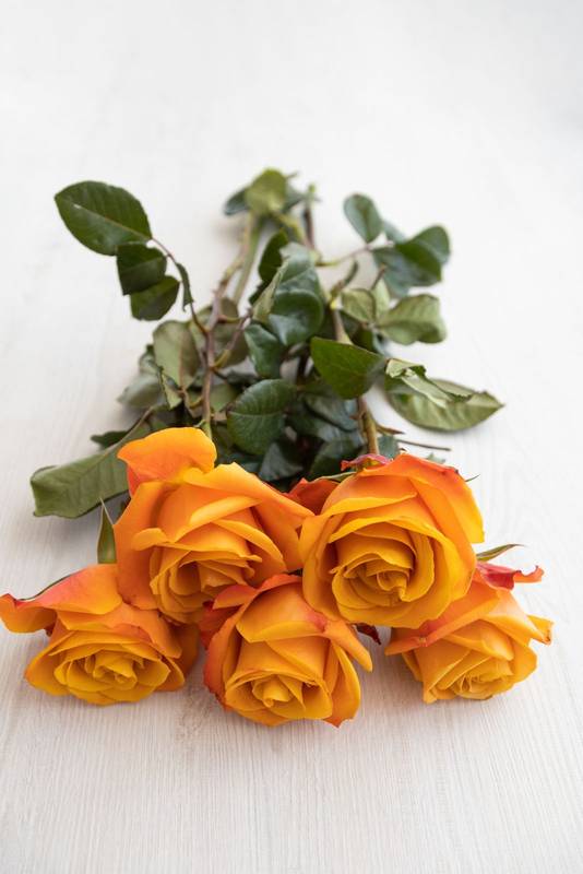 bouquet of yellow roses with orange , romantic gift