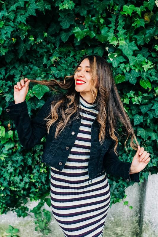 casual striped dress and jacket, lifestyle , girl playing with hair
