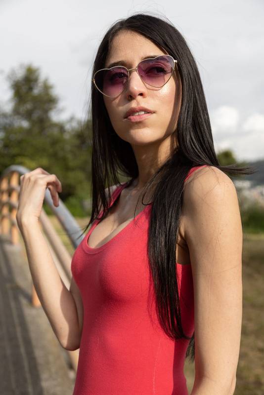 Young latin female model wearing accessories and casual summer