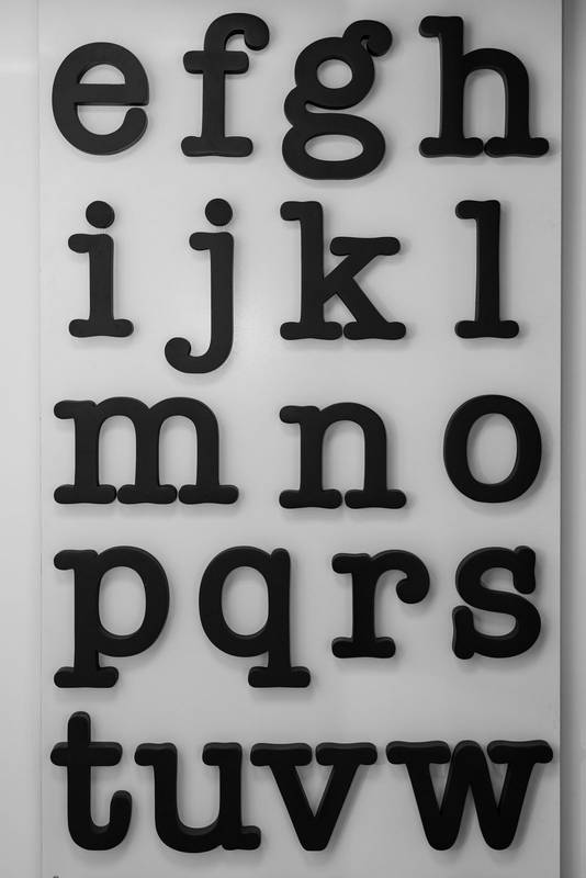 eye chart displaying multiple letters used by optometrists to assess visual acuity