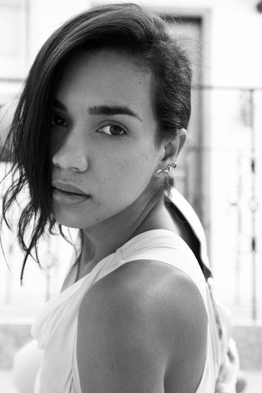 black and white  beautiful face of young latin woman with natural makeup