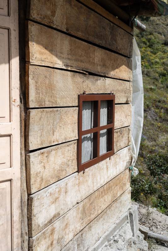 Rustic Window on Weathered Wall of Old House
