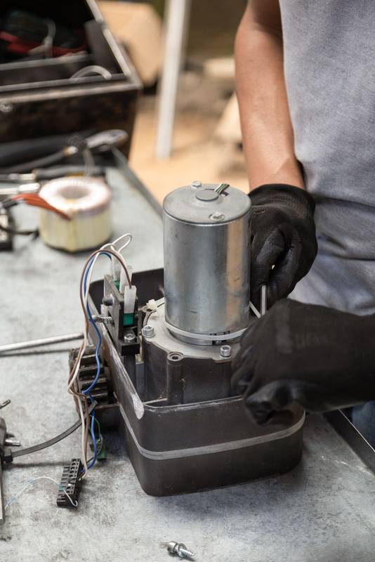 repairing a metal object that is on his workplace, technology and equipment restoration