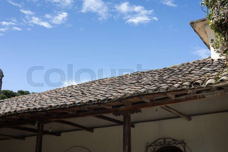 colonial hacienda roof in Ecuador, showing rustic clay tiles and architectural