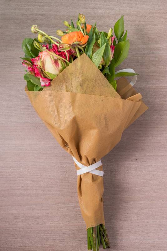 s wrapped in decorative paper, beauty of nature, colorful valentine gift to show love, in studio