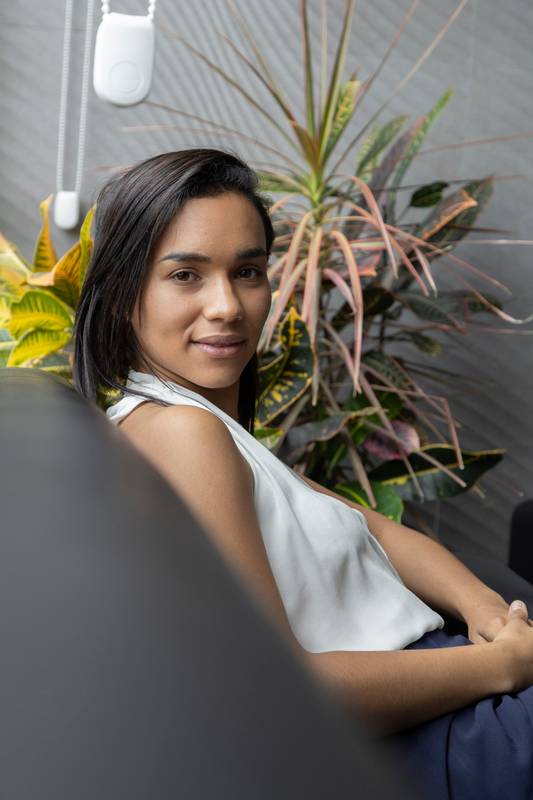 latin woman posing sitting