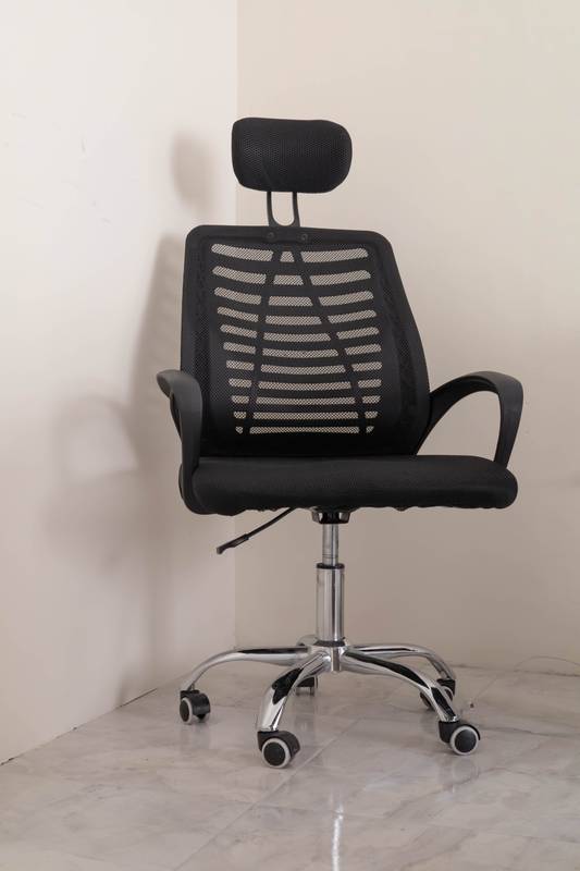 black ergonomic office chair featuring adjustable height, lumbar support, and swivel base. Ideal for home offices